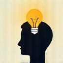 Icon representing digital skills with a lightbulb over a head.